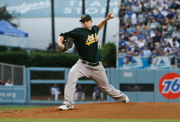 LOS ANGELES, CA - JUNE 16:  Dallas Braden #51 of the Oakland Athletics pitches against the Los Angeles Dodgers at Dodger Stadium on June 16, 2009 in Los Angeles, California.  (Photo by Jeff Gross/Getty Images)