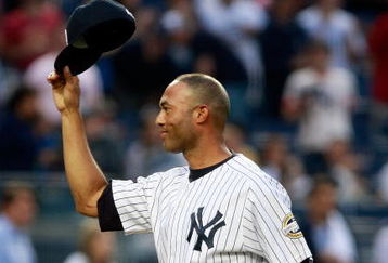 NEW YORK - JUNE 30:  Relief pitcher Mariano Rivera #42 of the New York Yankees waves to the crowd after throwing out the ceremonial first pitch in a game against the Seattle Mariners June 30, 2009 at Yankee Stadium in the Bronx borough of New York City.  (Photo by Mario Tama/Getty Images)