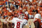 AUSTIN, TX - SEPTEMBER 27: Quarterback Tyler Wilson #8 of the Arkansas Razorbacks throws against Texas Longhorns in the fourth quarter on September 27, 2008 at Darrell K Royal-Texas Memorial Stadium in Austin, Texas.  Texas won 52-10. (Photo by Brian Bahr/Getty Images)