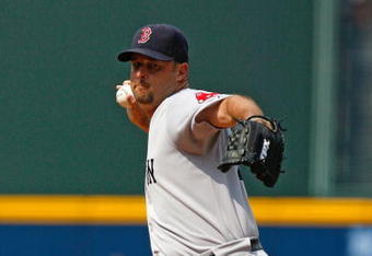 ATLANTA - JUNE 27:  Starting pitcher Tim Wakefield #49 of the Boston Red Sox pitches against the Atlanta Braves at Turner Field on June 27, 2009 in Atlanta, Georgia.  (Photo by Kevin C. Cox/Getty Images)