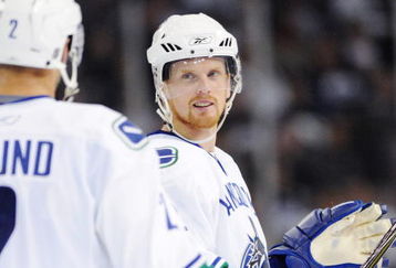 EDMONTON, AB - SEPTEMBER 22:  Mattias Ohlund #2 and Daniel Sedin #22 of the Vancouver Canucks look on in the third period against the Edmonton Oilers during an NHL preseason game on September 22, 2008 at Rexall Arena in Edmonton, Canada. The Canucks defeated the Oilers 4-3 in shootout overtime. (Photo by Jimmy Jeong/Getty Images)
