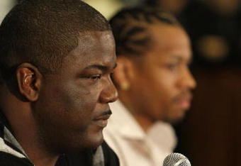 AUBURN HILLS, MI - NOVEMBER 04:  President of Basketball Operations Joe Dumars of the Detroit Pistons introduces Allen Iverson #1 at press conference after being traded from the Denver Nuggets on November 4, 2008 at the Palace of Auburn Hills in Auburn Hills, Michigan. NOTE TO USER: User expressly acknowledges and agrees that, by downloading and or using this photograph, User is consenting to the terms and conditions of the Getty Images License Agreement.  (Photo by Gregory Shamus/Getty Images)