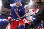 NEW YORK - APRIL 26: Scott Gomez #19 of the New York Rangers skates against Mike Green #52 of the Washington Capitals during Game Six of the Eastern Conference Quarterfinal Round of the 2009 NHL Stanley Cup Playoffs at Madison Square Garden on April 26, 2009 in New York, New York.  (Photo by Bruce Bennett/Getty Images)