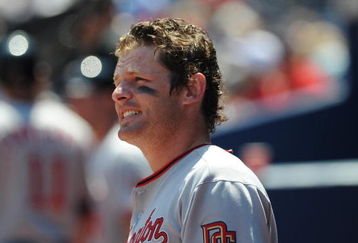 ATLANTA - APRIL 12: Outfielder Austin Kearns #25 of the Washington Nationals watches play against the Atlanta Braves April 12, 2009 at Turner Field in Atlanta, Georgia.  (Photo by Al Messerschmidt/Getty Images) 