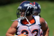 ENGLEWOOD, CO - JUNE 12: Running back Peyton Hillis #22 of the Denver Broncos warms up during minicamp practice at the Broncos Dove Valley training facility on June 12, 2009 in Englewood, Colorado. (Photo by Doug Pensinger/Getty Images)