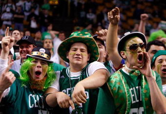 BOSTON - MAY 22:  Fans cheer in Game Two of the Eastern Conference Finals between the Boston Celtics and the Detroit Pistons during the 2008 NBA Playoffs at the TD Banknorth Garden on May 22, 2008 in Boston, Massachusetts.  The Pistons won 103-97.   NOTE TO USER: User expressly acknowledges and agrees that, by downloading and or using this photograph, User is consenting to the terms and conditions of the Getty Images License Agreement  (Photo by Jim Rogash/Getty Images)