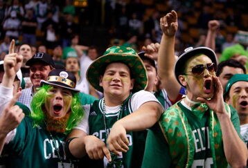 BOSTON - MAY 22:  Fans cheer in Game Two of the Eastern Conference Finals between the Boston Celtics and the Detroit Pistons during the 2008 NBA Playoffs at the TD Banknorth Garden on May 22, 2008 in Boston, Massachusetts.  The Pistons won 103-97.   NOTE TO USER: User expressly acknowledges and agrees that, by downloading and or using this photograph, User is consenting to the terms and conditions of the Getty Images License Agreement  (Photo by Jim Rogash/Getty Images)