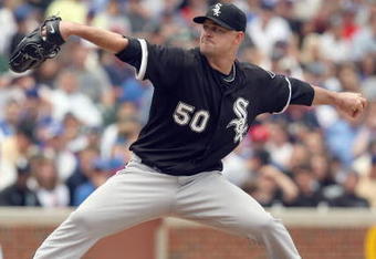 CHICAGO - JUNE 17: John Danks #50 of the Chicago White Sox pitches against the Chicago Cubs on June 17, 2009 at Wrigley Field in Chicago, Illinois. (Photo by Jonathan Daniel/Getty Images)