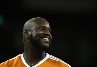 OAKLAND, CA - MARCH 15:  Shaquille O'Neal #32 of the Phoenix Suns looks on against the Golden State Warriors during an NBA game on March 15, 2009 at Oracle Arena in Oakland, California. NOTE TO USER: User expressly acknowledges and agrees that, by downloading and or using this photograph, User is consenting to the terms and conditions of the Getty Images License Agreement.  (Photo by Jed Jacobsohn/Getty Images)