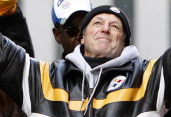 PITTSBURGH - FEBRUARY 03: Defensive Coordinator Dick LeBeau of the Pittsburgh Steelers pumps his fists during a parade to celebrate winning Super Bowl XLIII on February 3, 2009 in Pittsburgh, Pennsylvania.  (Photo by Gregory Shamus/Getty Images)