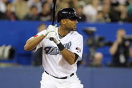TORONTO - APRIL 6:  Alex Rios #15 of the Toronto Blue Jays stands at bat during the Opening Day game against the Detroit Tigers at the Rogers Centre on April 6, 2009 in Toronto, Ontario. (Photo by: Dave Sandford/Getty Images)