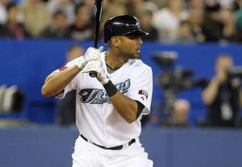 TORONTO - APRIL 6:  Alex Rios #15 of the Toronto Blue Jays stands at bat during the Opening Day game against the Detroit Tigers at the Rogers Centre on April 6, 2009 in Toronto, Ontario. (Photo by: Dave Sandford/Getty Images)