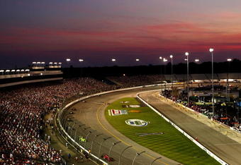 RICHMOND, VA - JUNE 27: The sun sets as drivers go into turn two during the IRL Indycar Series SunTrust Indy Challenge on June 27, 2009 at the Richmond International Speedway in Richmond, Virginia.  (Photo by Chris McGrath/Getty Images)