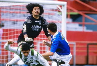 26 Jan 1997:  Rene Higuita and Adrian Czorndmar fight for the ball during a Copa Cup game between Cristal and Nacional at the Orange Bowl in Miami, Florida.  Cristal won the game 2-0. Mandatory Credit: Andy Lyons  /Allsport