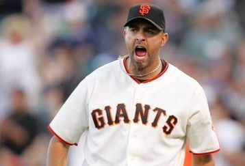 SAN FRANCISCO - MAY 17:  Pitcher Jeremy Affeldt #41of the San Francisco Giants celebrates after the Mets hit in to a double play with the bases loaded to end the eighth inning of their game against the New York Mets at AT&T Park on May 17, 2009 in San Francisco, California.  (Photo by Ezra Shaw/Getty Images)