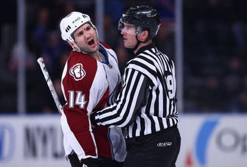NEW YORK - FEBRUARY 28:  Ian Laperriere #14 of the Colorado Avalanche shouts at the New York Rangers bench as linesman Steve Barton #59 restrains him during the game on February 28, 2009 at Madison Square Garden in New York City.  (Photo by Chris McGrath/Getty Images)