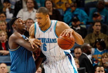 NEW ORLEANS - DECEMBER 30:  Tyson Chandler #6 of the New Orleans Hornets drives the ball around Andray Blatche #32 of the Washington Wizards on December 30, 2008 at the New Orleans Arena in New Orleans, Louisiana.  NOTE TO USER: User expressly acknowledges and agrees that, by downloading and/or using this Photograph, user is consenting to the terms and conditions of the Getty Images License Agreement.  The Hornets defeated the Wizards 97-85.  (Photo by Chris Graythen/Getty Images)