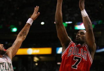 BOSTON - MAY 02:  Ben Gordon #7 of the Chicago Bulls takes a shot as Eddie House #50 of the Boston Celtics defends in Game Seven of the Eastern Conference Quarterfinals during the 2009 NBA Playoffs at TD Banknorth Garden on May 2, 2009 in Boston, Massachusetts. The Celtics defeated the Bulls 109-99. NOTE TO USER: User expressly acknowledges and agrees that, by downloading and or using this photograph, User is consenting to the terms and conditions of the Getty Images License Agreement.  (Photo by Elsa/Getty Images)