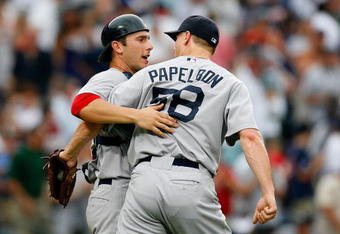 ATLANTA - JUNE 27:  Relief pitcher Jonathan Papelbon #58 of the Boston Red Sox celebrates with catcher George Kottaras #16 after defeating the Atlanta Braves 1-0 at Turner Field on June 27, 2009 in Atlanta, Georgia.  (Photo by Kevin C. Cox/Getty Images)
