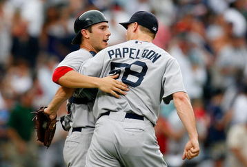 ATLANTA - JUNE 27:  Relief pitcher Jonathan Papelbon #58 of the Boston Red Sox celebrates with catcher George Kottaras #16 after defeating the Atlanta Braves 1-0 at Turner Field on June 27, 2009 in Atlanta, Georgia.  (Photo by Kevin C. Cox/Getty Images)