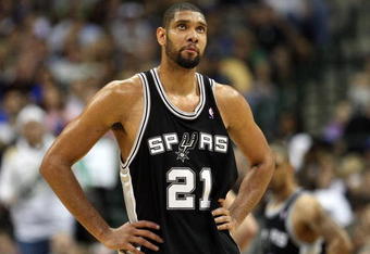 DALLAS - APRIL 25:  Forward Tim Duncan #21 of the San Antonio Spurs during play against the Dallas Mavericks in Game Four of the Western Conference Quarterfinals during the 2009 NBA Playoffs at American Airlines Center on April 25, 2009 in Dallas, Texas. NOTE TO USER: User expressly acknowledges and agrees that, by downloading and or using this photograph, User is consenting to the terms and conditions of the Getty Images License Agreement.  (Photo by Ronald Martinez/Getty Images)