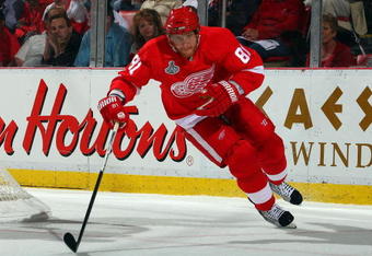 DETROIT - JUNE 12:  Marian Hossa #81 of the Detroit Red Wings skates against the Pittsburgh Penguins during Game Seven of the 2009 NHL Stanley Cup Finals at Joe Louis Arena on June 12, 2009 in Detroit, Michigan.  (Photo by Jim McIsaac/Getty Images)