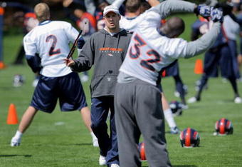 ENGLEWOOD, CO - MAY 03:  Head coach Josh McDaniels of the Denver Broncos chats with running back LaMont Jordan #32 during minicamp at the Broncos training facility on May 3, 2009 in Englewood, Colorado.  (Photo by Doug Pensinger/Getty Images)