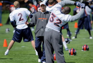 ENGLEWOOD, CO - MAY 03:  Head coach Josh McDaniels of the Denver Broncos chats with running back LaMont Jordan #32 during minicamp at the Broncos training facility on May 3, 2009 in Englewood, Colorado.  (Photo by Doug Pensinger/Getty Images)