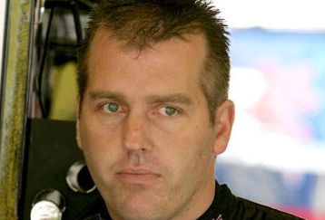 DARLINGTON, SC - MAY 08: Jeremy Mayfield, driver of the #41 SmallSponsor.com Toyota, stands in the garage during practice for the NASCAR Sprint Cup Series Southern 500 on May 8, 2009 at Darlington Raceway in Darlington, South Carolina.  (Photo by Jerry Markland/Getty Images for NASCAR)