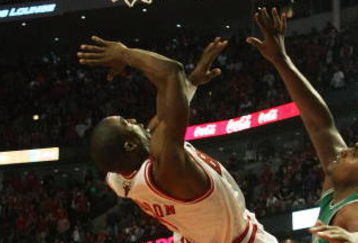 CHICAGO - APRIL 26: Ben Gordon #7 of the Chicago Bulls is fouled while shooting by Glen Davis #11 of the Boston Celtics in Game Four of the Eastern Conference Quarterfinals during the 2009 NBA Playoffs at the United Center on April 26, 2009 in Chicago, Illinois. The Bulls defeated the Celtics 121-118 in double overtime. NOTE TO USER: User expressly acknowledges and agreees that, by downloading and/or using this Photograph, User is consenting to the terms and conditions of the Getty Images License Agreement. (Photo by Jonathan Daniel/Getty Images)