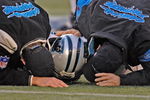 Carolina Panthers trainers examine running back Nick Goings during an injury timeout at  an NFC wildcard game January 8, 2006 at the Meadowlands.  The Carolina Panthers defeated the Giants 23 - 0.  (Photo by Al Messerschmidt/Getty Images)