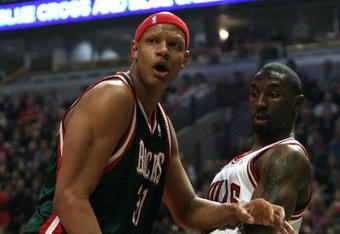 CHICAGO - MARCH 06:  Charlie Villanueva #31 of the Milwaukee Bucks reacts after he didn't get a call on an offensive play which he thought he was fouled on in the first quarter as Ben Gordon #7 of the Chicago Bulls looks on at the United Center on March 6, 2009 in Chicago, Illinois.  NOTE TO USER: User expressly acknowledges and agreees that, by downloading and/or using this Photograph, User is consenting to the terms and conditions of the Getty Images License Agreement.  (Photo by Jonathan Daniel/Getty Images)