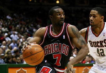 MILWAUKEE - FEBRUARY 18: Ben Gordon #7 of the Chicago Bulls drvies around Charlie Bell #42 of the Milwaukee Bucks on February 18, 2009 at the Bradley Center in Milwaukee, Wisconsin. The Bulls defeated the Bucks 113-104. NOTE TO USER: User expressly acknowledges and agreees that, by downloading and/or using this Photograph, User is consenting to the terms and conditions of the Getty Images License Agreement. (Photo by Jonathan Daniel/Getty Images)