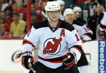 RALEIGH, NC - APRIL 26: John Madden #11 of the the New Jersey Devils skates out on the ice from the bench in the first period of Game Six of the Eastern Conference Quarterfinals of the 2009 Stanley Cup Playoffs against the Carolina Hurricanes on April 26, 2009 at the RBC Center in Raleigh, North Carolina. (Photo by Steve Dykes/Getty Images)