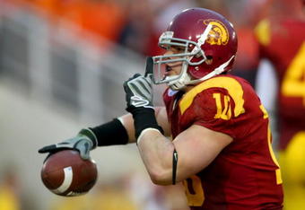 PASADENA, CA - JANUARY 01:  Brian Cushing #10 of the USC Trojans celebrates after recovering the fumble by Jacob Willis #83 of the Illinois Fighting Illini in the third quarter of the 'Rose Bowl presented by Citi' at the Rose Bowl on January 1, 2008 in Pasadena, California.  (Photo by Donald Miralle/Getty Images)