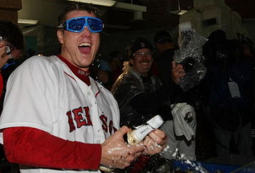 BOSTON - OCTOBER 06:  Jonathan Papelbon #58 of the Boston Red Sox celebrates in the clubhouse after the Red Sox scored a run in the bottom of the ninth inning to win Game Four of the American League Championship Series on October 6, 2008  at Fenway Park in Boston, Massachusetts. The Red Sox defeated the Angels 3-2 to advance to the ALCS.  (Photo by Elsa/Getty Images)