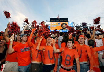 AUBURN, AL - SEPTEMBER 20: Auburn fans cheer as defensive lineman Sen'Derrick Marks #94 of the Auburn Tigers is announced prior to taking on the LSU Tigers missed a field goal at Jordan-Hare Stadium on September 20, 2008 in Auburn, Alabama. (Photo by Doug Benc/Getty Images)