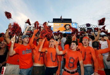 AUBURN, AL - SEPTEMBER 20: Auburn fans cheer as defensive lineman Sen'Derrick Marks #94 of the Auburn Tigers is announced prior to taking on the LSU Tigers missed a field goal at Jordan-Hare Stadium on September 20, 2008 in Auburn, Alabama. (Photo by Doug Benc/Getty Images)
