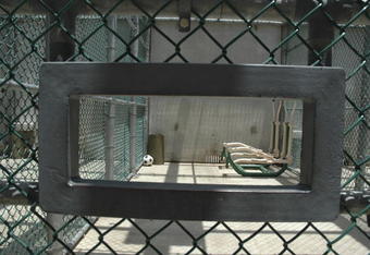 GUANTANAMO BAY NAVAL BASE, CUBA - JULY 23:  In this image reviewed by the U.S. Military, a soccer ball sits inside an exercise area at the detention facility on July 23, 2008 at Guantanamo Bay U.S. Naval Base, in Cuba. The military base is providing the location for the trial of Salim Hamdan, the former driver for Osama bin Laden, who is charged with conspiracy and aiding terrorism and is the first prisoner to face a U.S. war-crimes trial since World War II.  (Randall Mikkelsen-Pool/Getty Images)