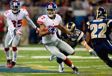 ST. LOUIS, MO - SEPTEMBER 14:  Domenik Hixon #87 of the New York Giants carries the ball during the game against the St. Louis Rams at Edward Jones Dome on September 14, 2008 in St. Louis, Missouri. (Photo by Dilip Vishwanat/Getty Images)