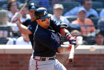 NEW YORK - MAY 13:  Martin Prado #14 of the Atlanta Braves bats against the New York Mets on May 13, 2009 at Citi Field in the Flushing neighborhood of the Queens borough of New York City. The Braves defeated the Mets 8-7 in twelve innings.  (Photo by Jim McIsaac/Getty Images)