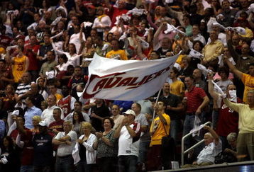 CLEVELAND - MAY 28: Fans wave a Cavaliers flag during Game Five of the Eastern Conference Finals between the Cleveland Cavaliers and the Orlando Magic  during the 2009 Playoffs at Quicken Loans Arena on May 28, 2009 in Cleveland, Ohio. NOTE TO USER: User expressly acknowledges and agrees that, by downloading and or using this photograph, User is consenting to the terms and conditions of the Getty Images License Agreement  (Photo by Elsa/Getty Images)
