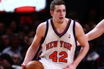 NEW YORK - JANUARY 23:  David Lee #42 of the New York Knicks dribbles the ball upcourt during the game against the Memphis Grizzlies at Madison Square Garden January 23, 2009 in New York City. NOTE TO USER: User expressly acknowledges and agrees that, by downloading and/or using this Photograph, User is consenting to the terms and conditions of the Getty Images License Agreement. The Knicks defeated the Grizzlies 108-88. (Photo by Chris McGrath/Getty Images)