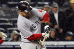 NEW YORK - MAY 05:  Mike Lowell #25 of the Boston Red Sox breaks his bat against the New York Yankees in the eigth innig on May 5, 2009 at Yankee Stadium in the Bronx borough of New York City.  (Photo by Jim McIsaac/Getty Images)