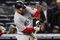NEW YORK - MAY 05:  Mike Lowell #25 of the Boston Red Sox breaks his bat against the New York Yankees in the eigth innig on May 5, 2009 at Yankee Stadium in the Bronx borough of New York City.  (Photo by Jim McIsaac/Getty Images)