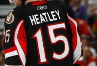 OTTAWA - MARCH 11:  Jason Spezza #19 and Dany Heatley #15 of the Ottawa Senators stand on the ice during the game against the Tampa Bay Lightning on March 11, 2009 at the Scotiabank Place in Ottawa, Ontario, Canada. (Photo by Phillip MacCallum/Getty Images)