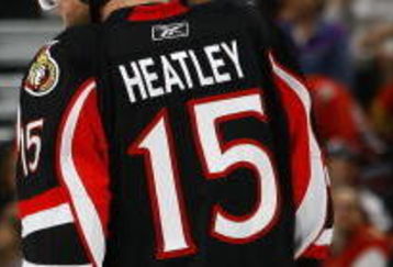 OTTAWA - MARCH 11:  Jason Spezza #19 and Dany Heatley #15 of the Ottawa Senators stand on the ice during the game against the Tampa Bay Lightning on March 11, 2009 at the Scotiabank Place in Ottawa, Ontario, Canada. (Photo by Phillip MacCallum/Getty Images)
