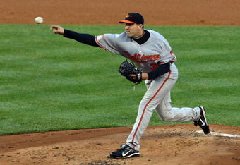 NEW YORK - MAY 19:  Brad Bergesen #64 of the Baltimore Orioles pitches against the New York Yankees on May 19, 2009 at Yankee Stadium in the Bronx borough of New York City.  The Yankees defeated the Orioles 9-1.  (Photo by Jim McIsaac/Getty Images)