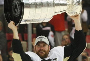 DETROIT - JUNE 12: Hal Gill #2 of the Pittsburgh Penguins holds the Stanley Cup following the Penguins victory over the Detroit Red Wings in Game Seven of the 2009 NHL Stanley Cup Finals at Joe Louis Arena on June 12, 2009 in Detroit, Michigan. (Photo by Bruce Bennett/Getty Images)