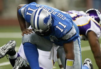 DETROIT - DECEMBER 07:  Quarterback Daunte Culpepper #11 of the Detroit Lions picks himself up against the Minnesoa Vikings during the NFL game at Ford Field on December 7, 2008 in Detroit, Michigan.  The Vikings defeated the Lions 20-16.  (Photo by Christian Petersen/Getty Images)